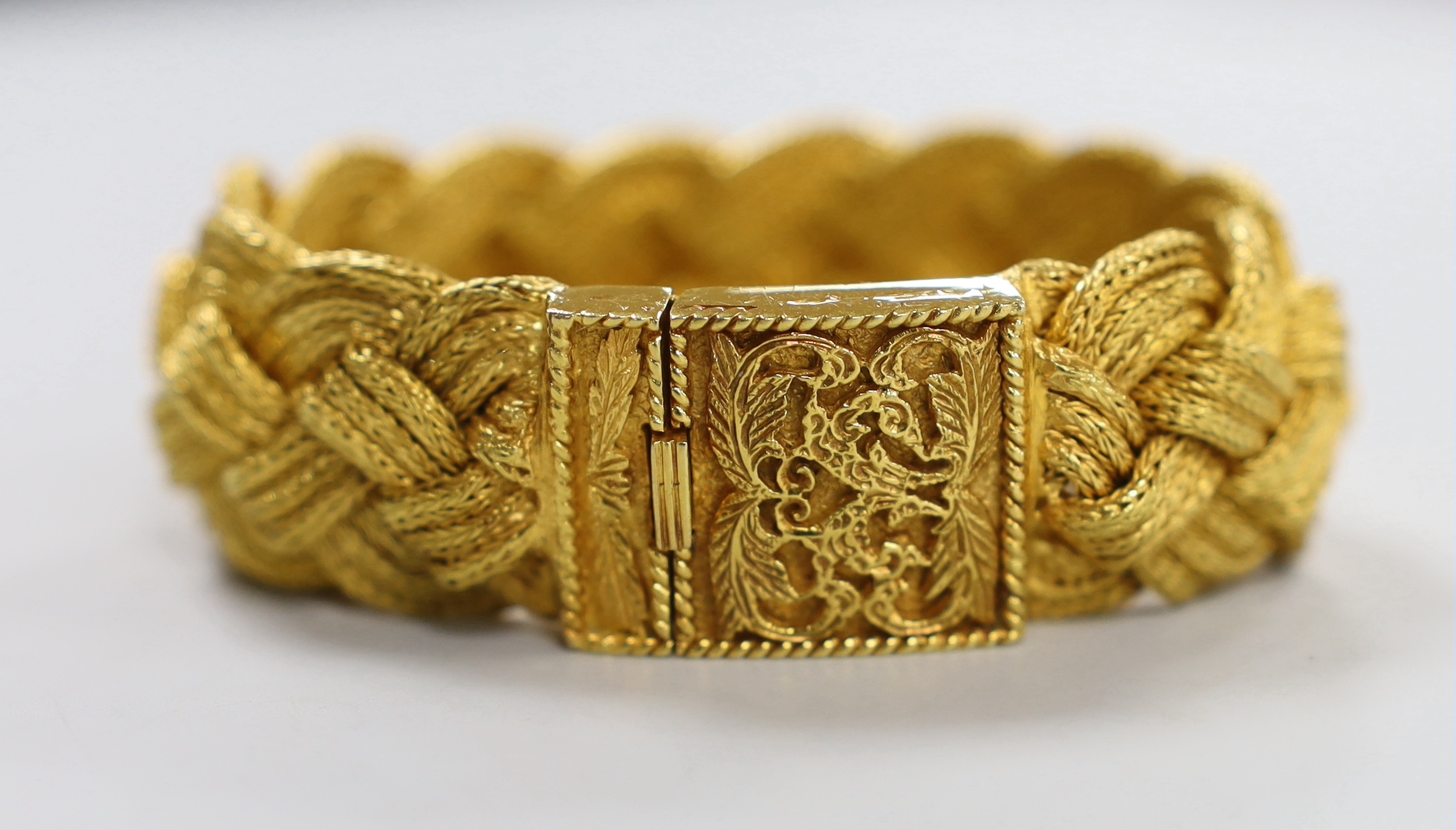 A 20th century Thai high grade yellow metal interwoven bracelet, 17.5cm, 128.3 grams.